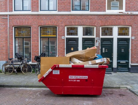 Construction site with organized waste removal services